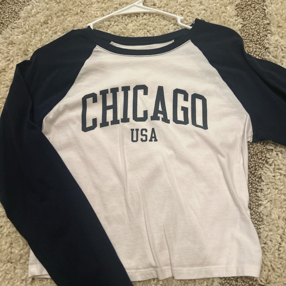 Abercrombie and Fitch brand, size medium, white and navy blue coloring